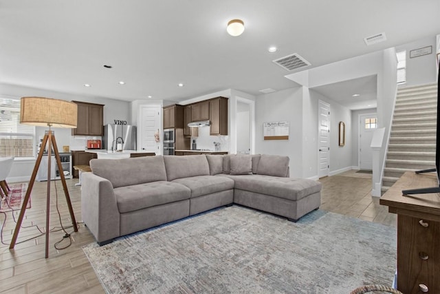 living room featuring a wealth of natural light