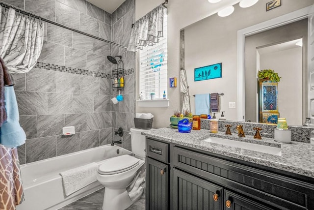 full bathroom with shower / tub combo with curtain, vanity, and toilet