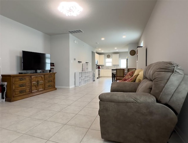 249 El Dorado Rd, Jarrell, TX 76537 - living area featuring light tile patterned flooring and baseboards