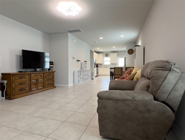 living room featuring light tile patterned floors