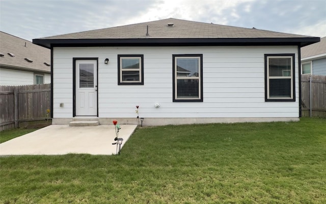 249 El Dorado Rd, Jarrell, TX 76537 - back of property with a patio area and a shingled roof