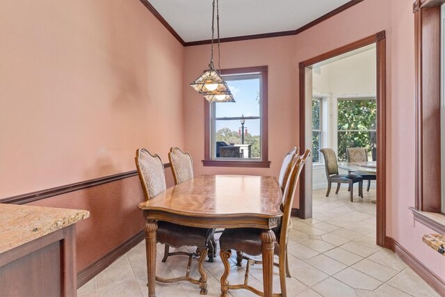 tiled dining space with crown molding