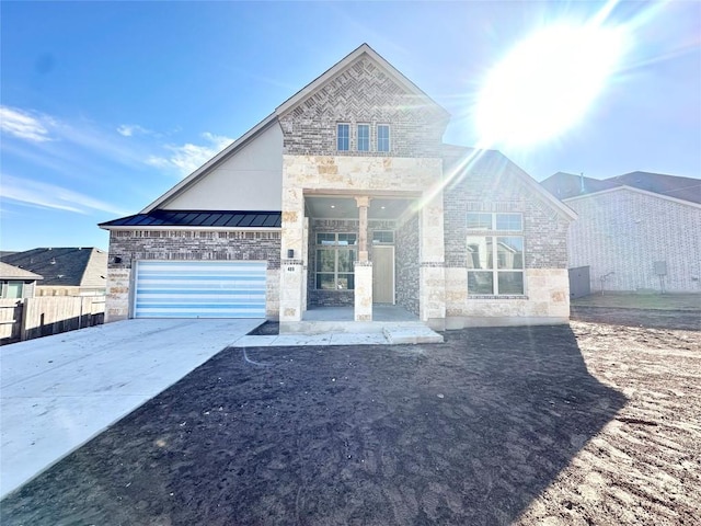 view of front of property featuring a garage