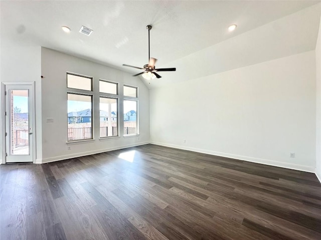 spare room with ceiling fan, dark wood-type flooring, and lofted ceiling