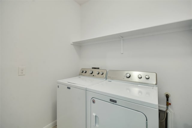 laundry area featuring independent washer and dryer