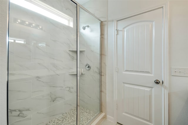 bathroom featuring walk in shower