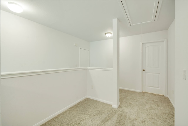 basement featuring light colored carpet