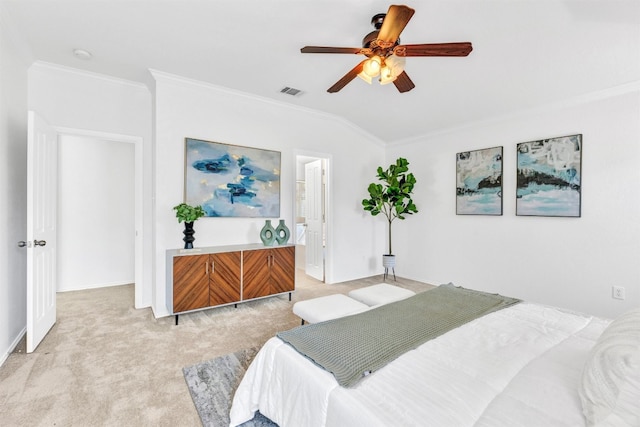 bedroom with light carpet, ensuite bathroom, ceiling fan, and crown molding