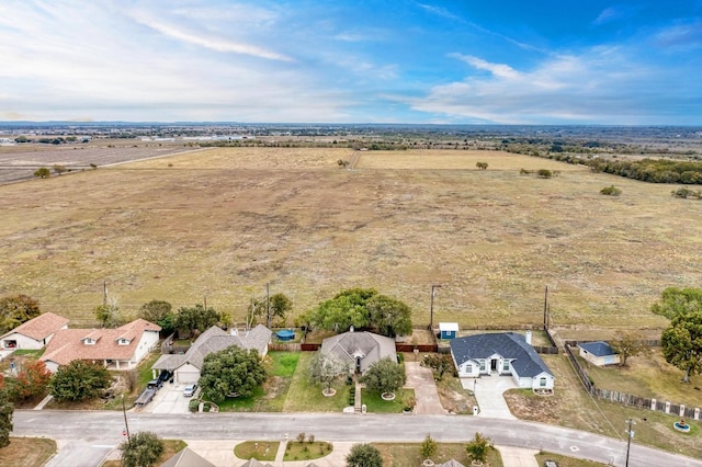 birds eye view of property featuring a rural view