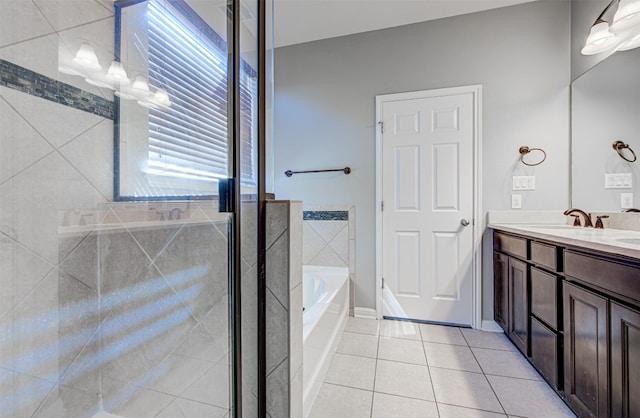 bathroom with vanity, tile patterned floors, and independent shower and bath