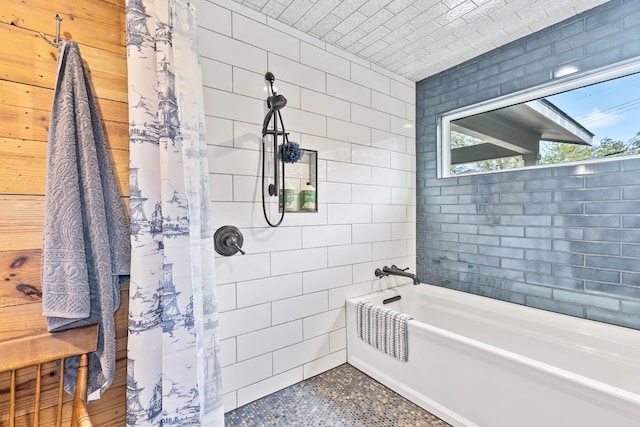 bathroom featuring shower / bath combination with curtain