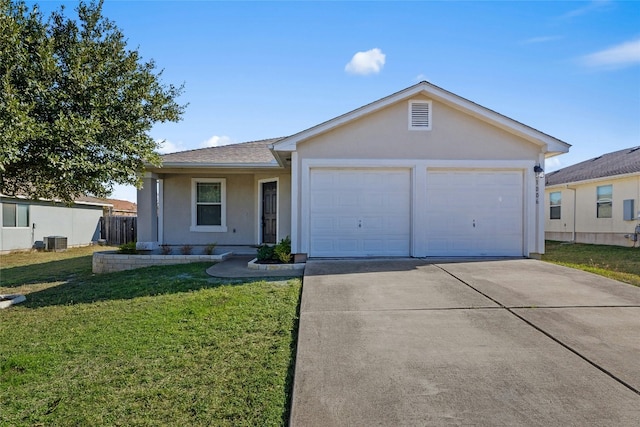 ranch-style home with a garage, a front lawn, and central air condition unit