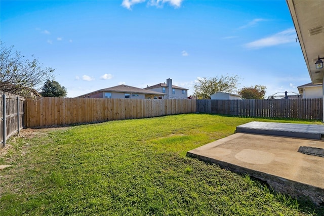 view of yard with a patio area