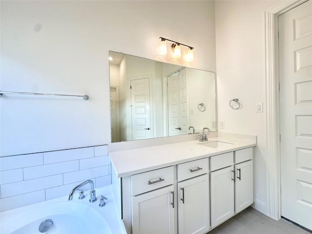 bathroom with vanity and a tub to relax in