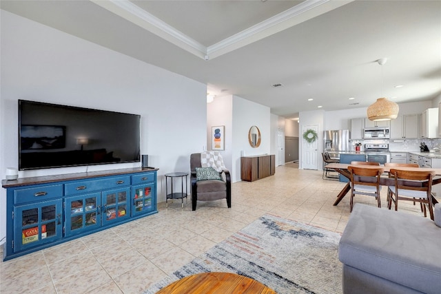 tiled living room featuring ornamental molding