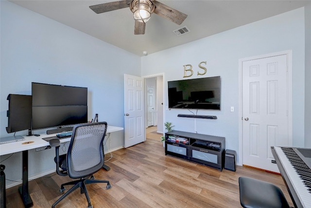 office area featuring light hardwood / wood-style flooring and ceiling fan