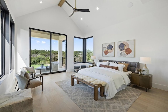 bedroom featuring high vaulted ceiling, access to outside, light hardwood / wood-style flooring, ceiling fan, and beam ceiling