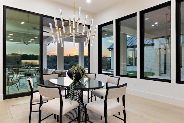 dining area featuring a chandelier and hardwood / wood-style floors