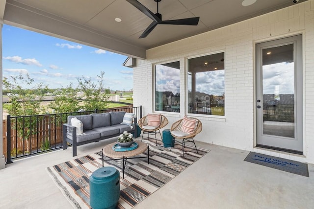 view of patio with ceiling fan and an outdoor hangout area