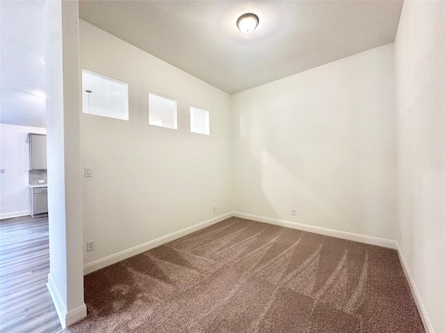 spare room featuring carpet flooring