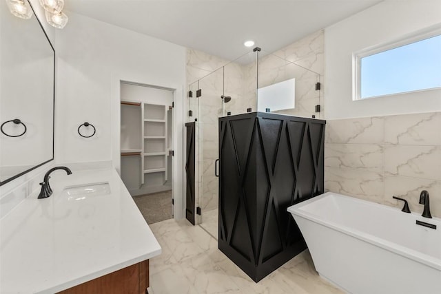 bathroom with vanity, tile walls, and plus walk in shower