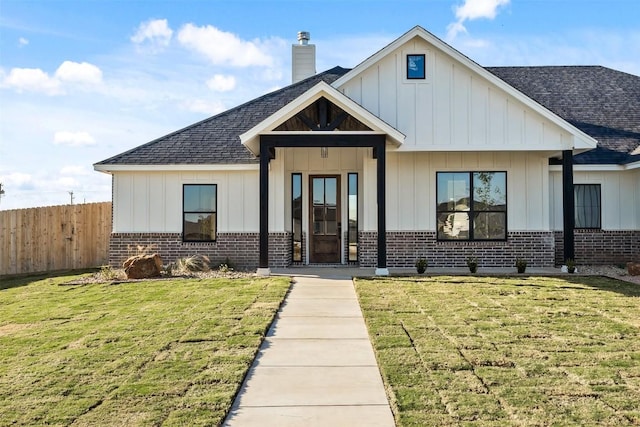 view of front of property with a front lawn