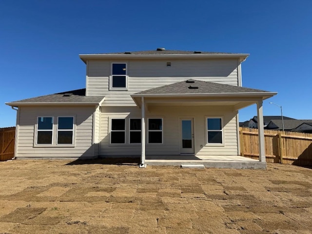 back of house featuring a patio