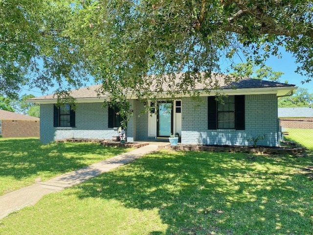 ranch-style house with a front yard