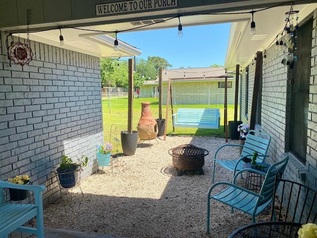 view of yard featuring a fire pit