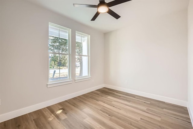 unfurnished room featuring ceiling fan and light hardwood / wood-style flooring