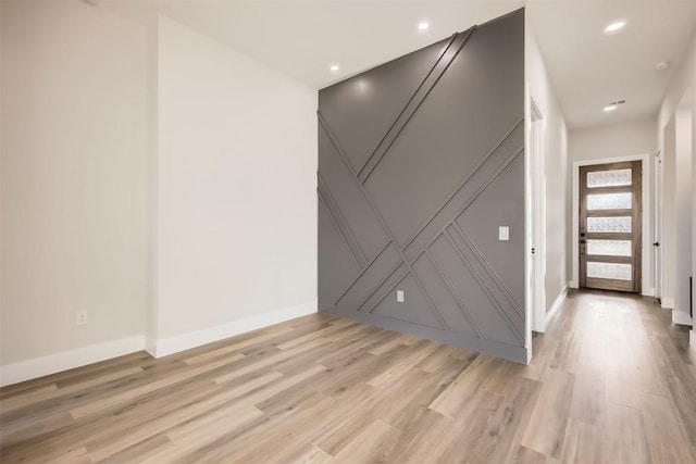 entryway with light hardwood / wood-style flooring