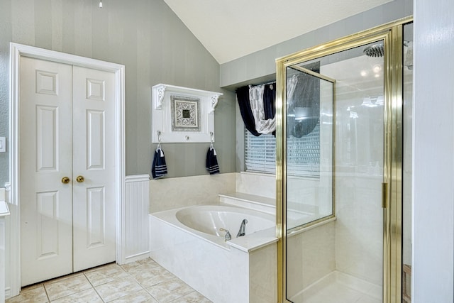 bathroom featuring tile patterned floors, plus walk in shower, and vaulted ceiling