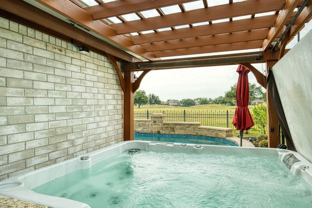 view of pool with a pergola, a rural view, and a hot tub