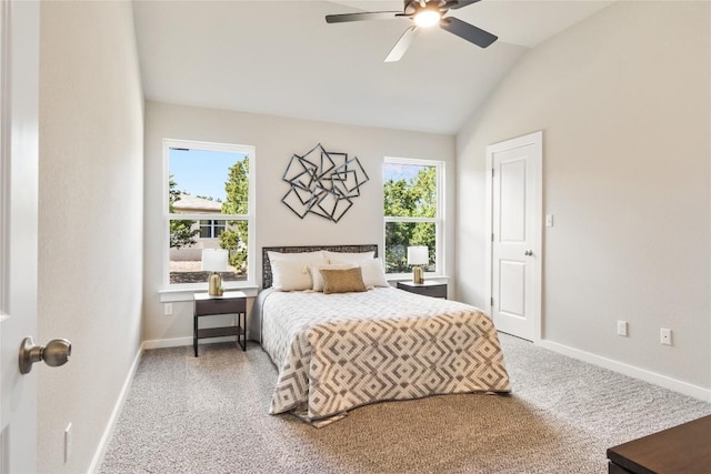 carpeted bedroom featuring ceiling fan, lofted ceiling, and multiple windows