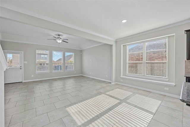 interior space with ceiling fan and ornamental molding