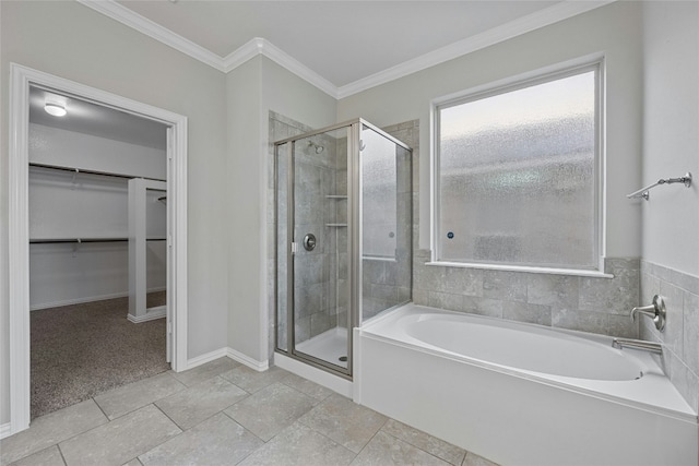 bathroom featuring shower with separate bathtub and crown molding