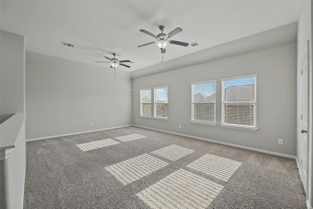 carpeted empty room with ceiling fan