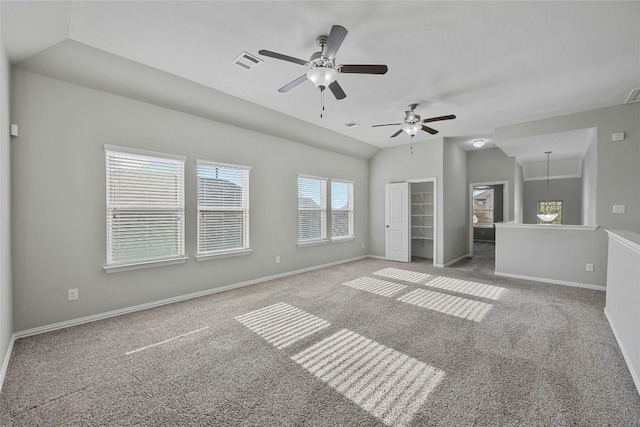 unfurnished bedroom featuring carpet flooring, ceiling fan, and lofted ceiling