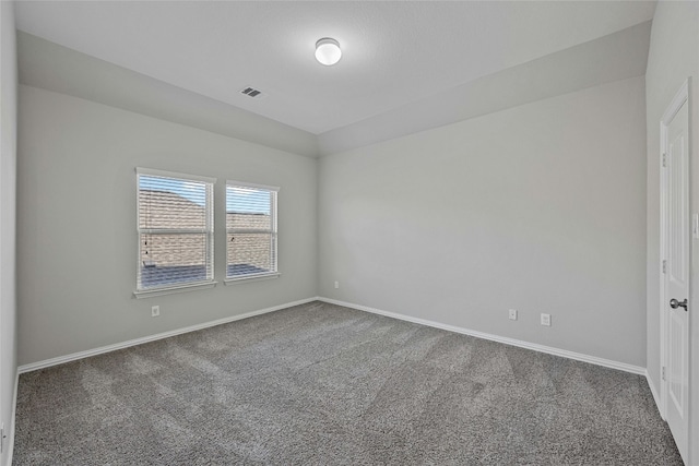 empty room featuring carpet floors