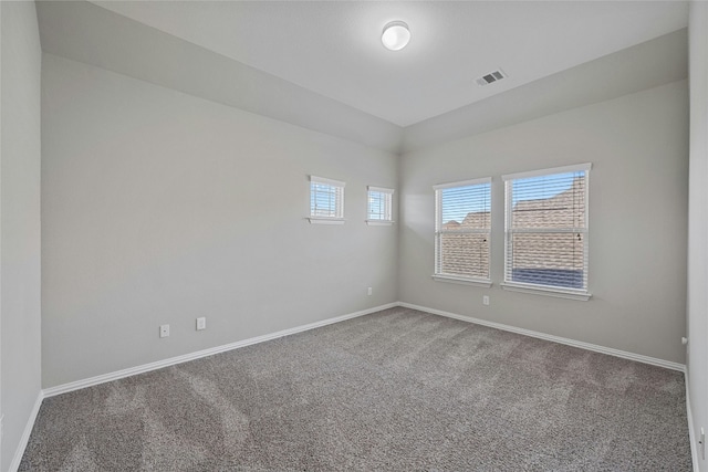 unfurnished room featuring carpet flooring