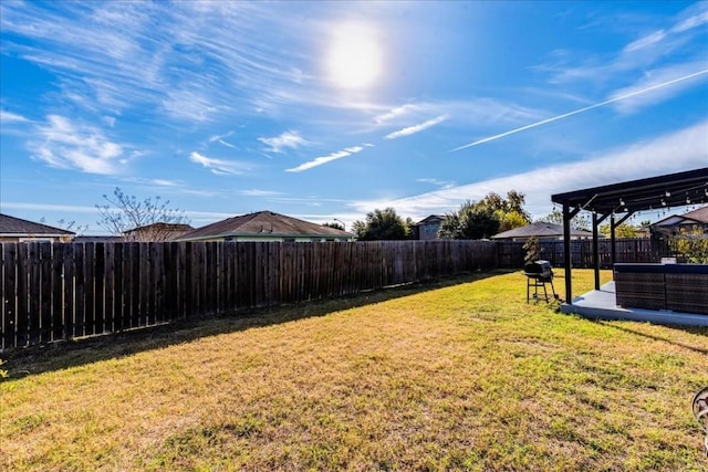 view of yard featuring an outdoor hangout area and a pergola