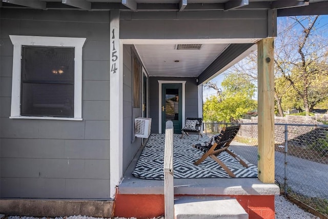 property entrance with a porch