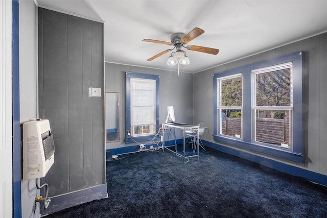 interior space featuring ceiling fan, an AC wall unit, and wooden walls