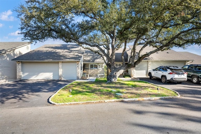 single story home featuring a garage