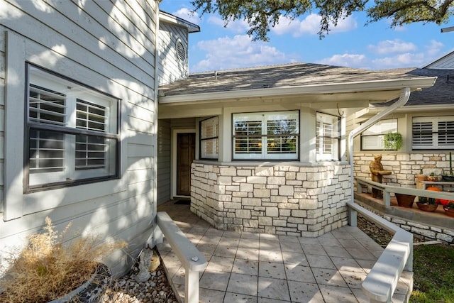 doorway to property featuring a patio