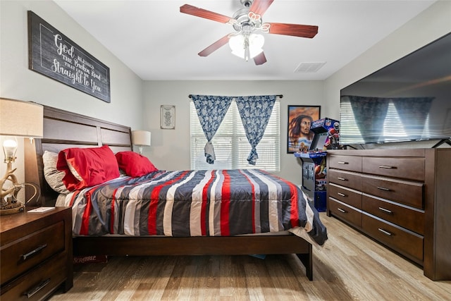 3204 Barksdale Dr, Austin, TX 78725 - bedroom featuring wood finished floors and a ceiling fan