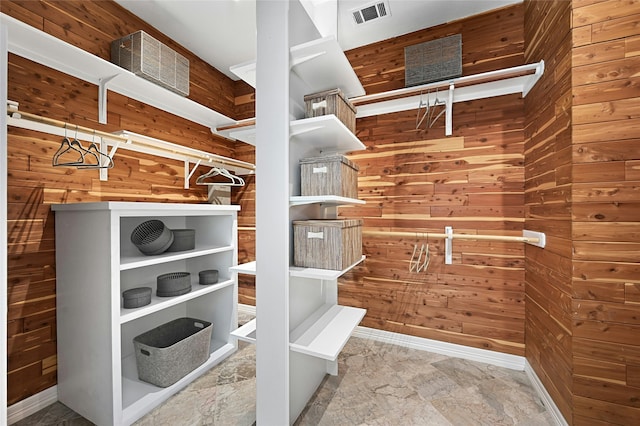 spacious closet with visible vents