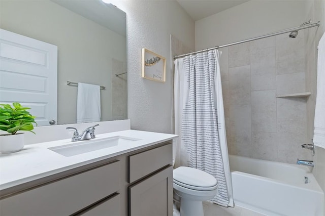 full bathroom featuring vanity, toilet, and shower / bath combo with shower curtain