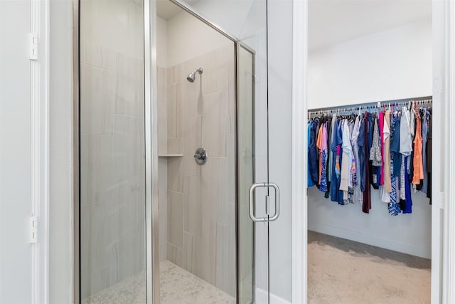 bathroom featuring an enclosed shower