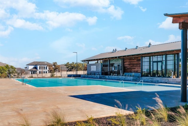 view of pool with a patio area